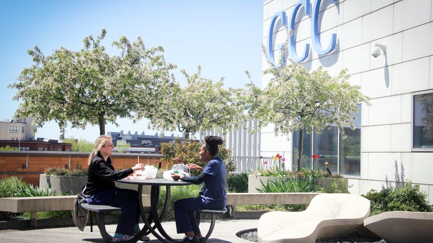 students eat together on patio